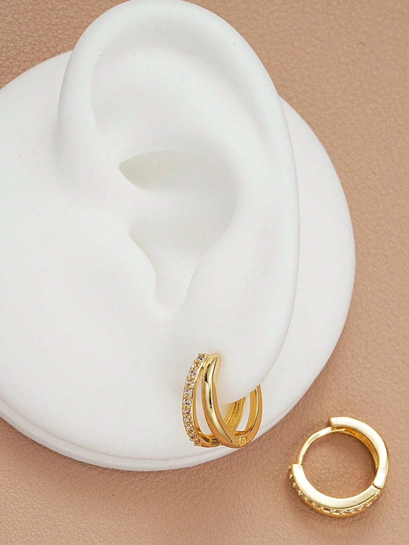 Elegant Gold-Plated Twisted Hoop Earrings with Crystal Accents