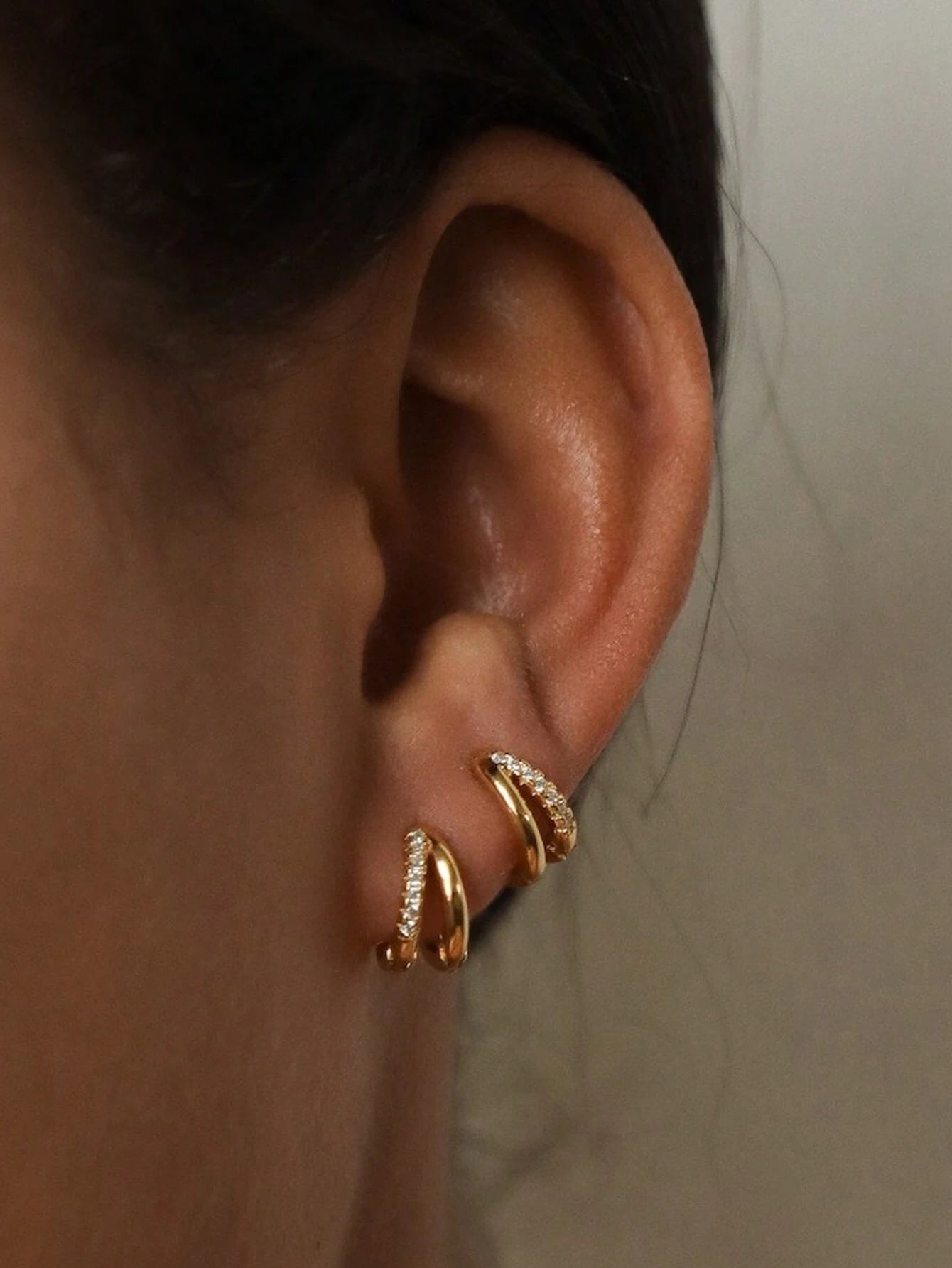 Elegant Gold-Plated Twisted Hoop Earrings with Crystal Accents