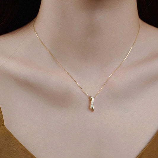 Sleek Gold-Tone Pendant Necklace with Sparkling Detail