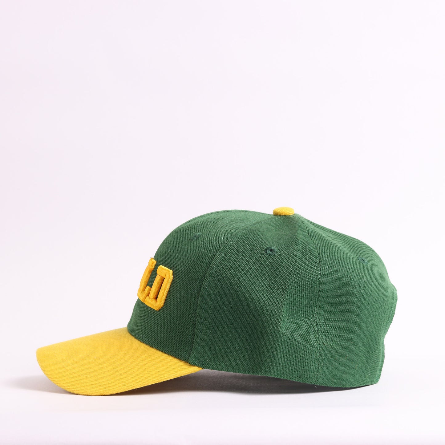 WILD Embroidered Two-Tone Snapback Baseball Cap | Forest Green & Gold